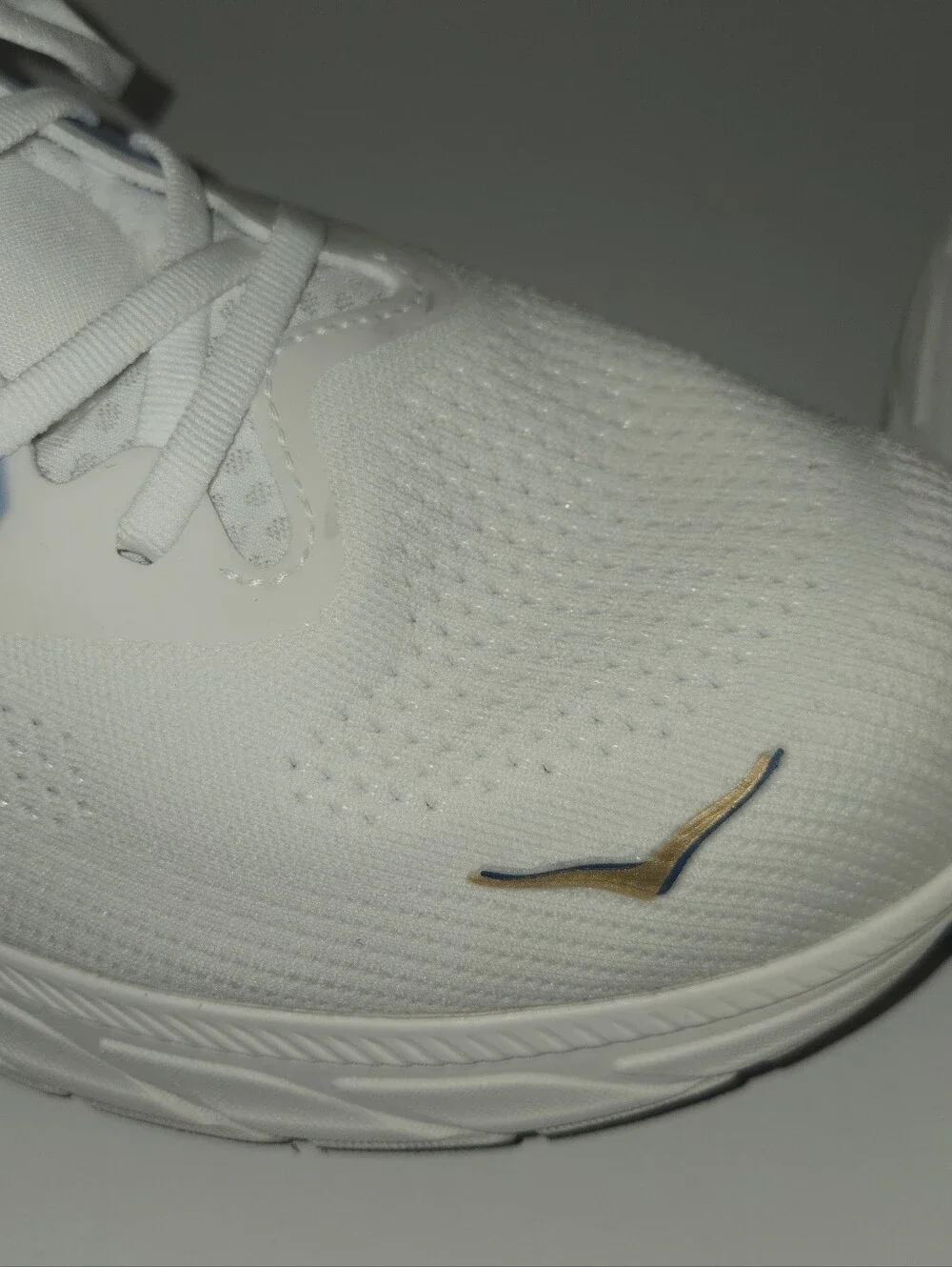 Hoka One One White and Navy Athletic Running Shoes with Gold Logo